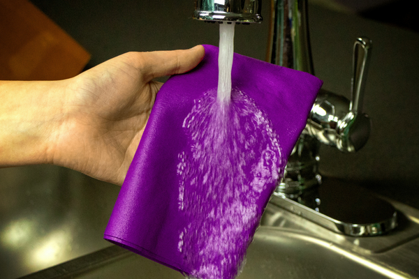 Purple UltimateCloth under running water